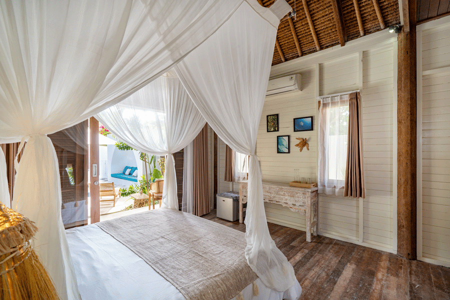Room View with Air Conditioning and Small Fridge